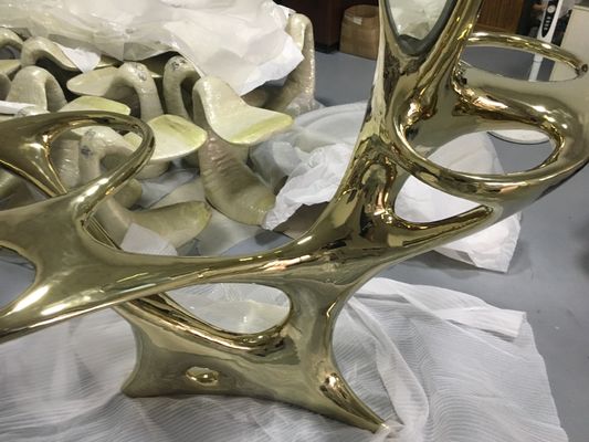 Stainless steel sculptural table with abstract style dresser interior decoration